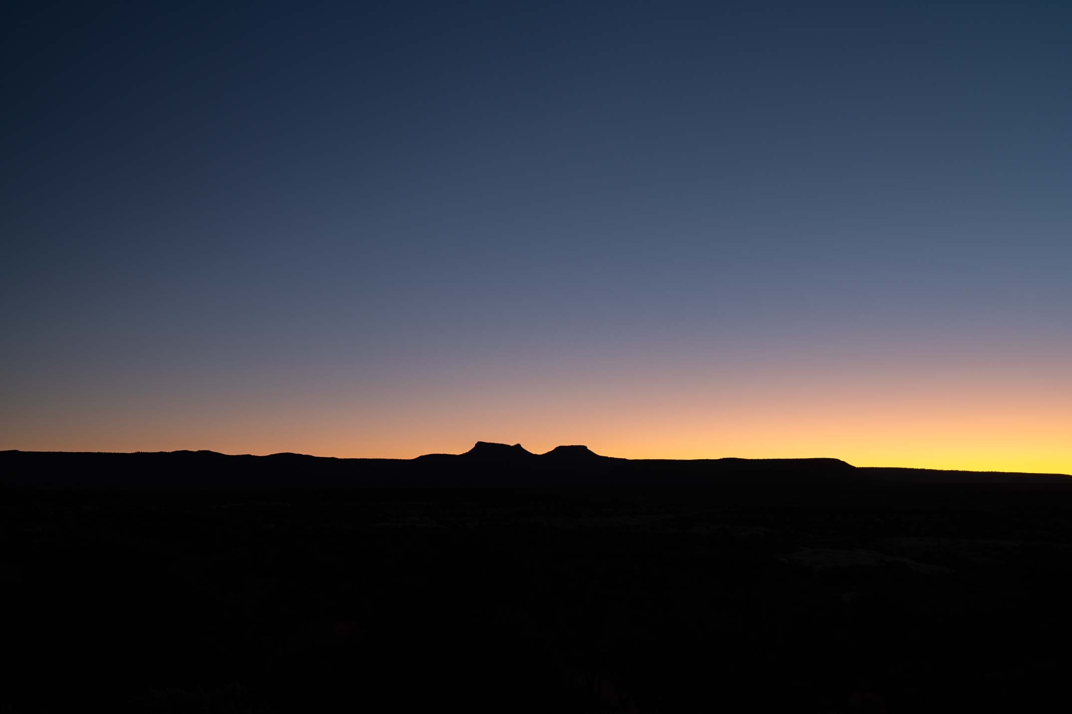 The twin buttes of Bears Ears at last light, southeastern Utah. More Than Just Parks.