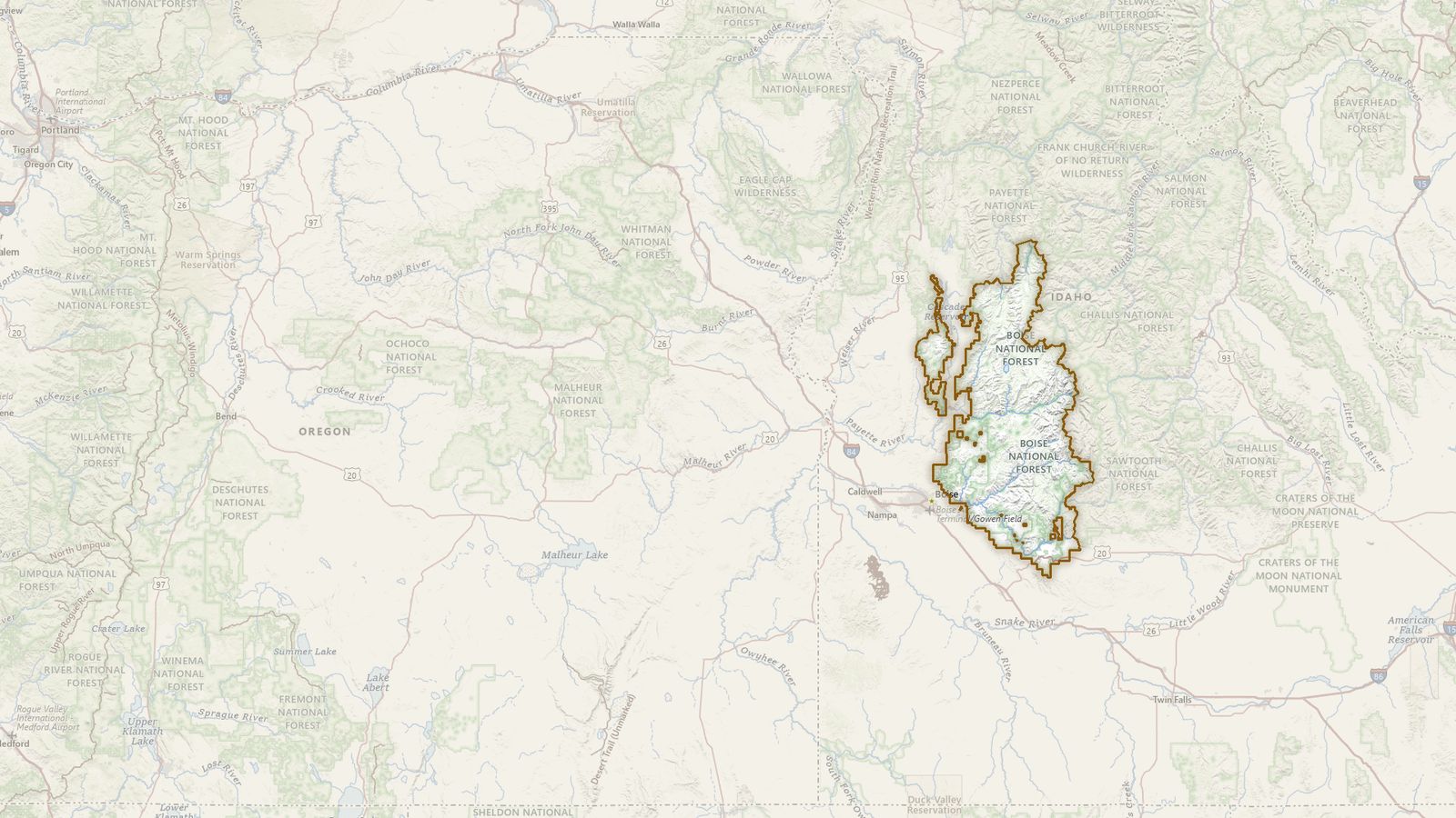 The boundary of the Boise National Forest drawn on the USGS topographic map, with the towns, highways and rivers around it.