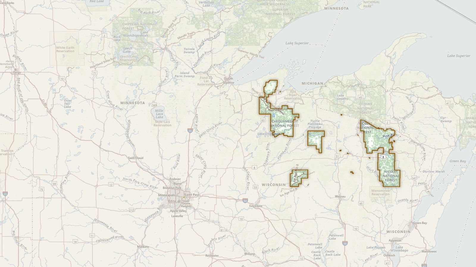 The boundary of the Chequamegon-Nicolet National Forest drawn on the USGS topographic map, with the towns, highways and rivers around it.