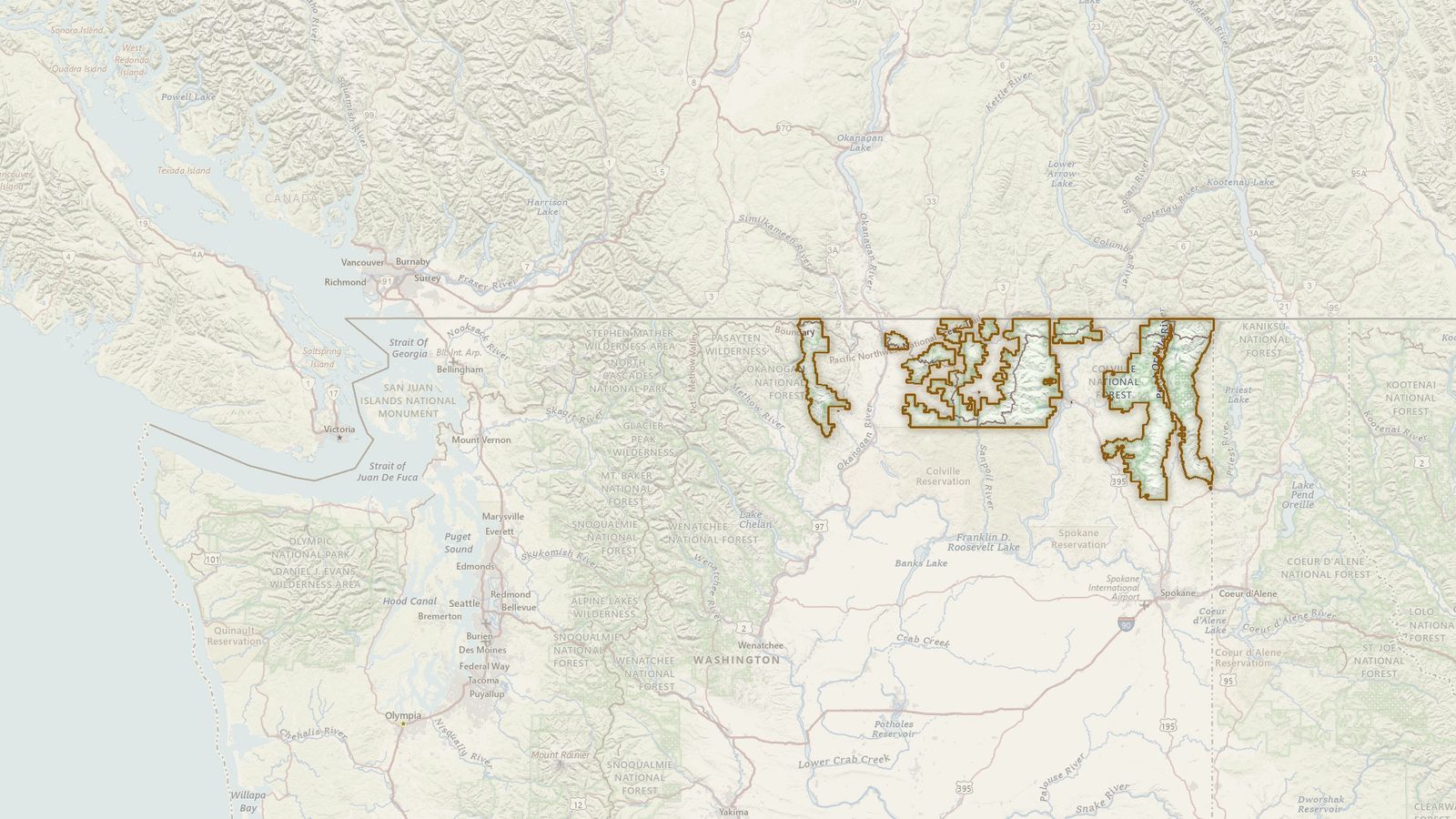 The boundary of the Colville National Forest drawn on the USGS topographic map, with the towns, highways and rivers around it.