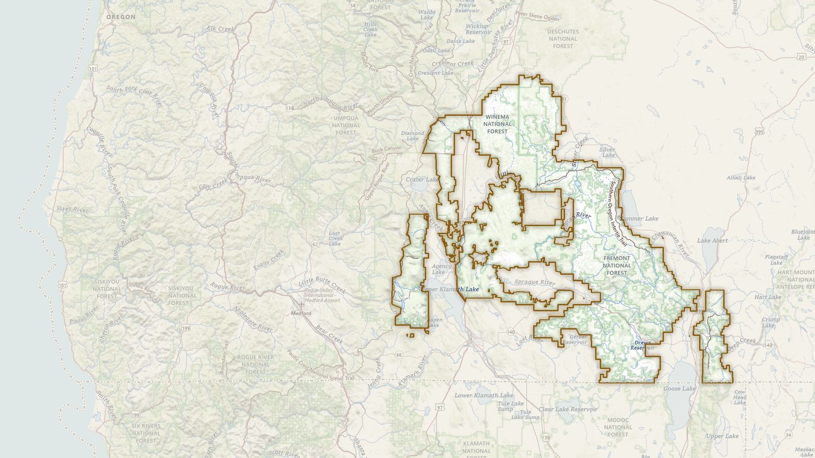The boundary of the Fremont-Winema National Forest drawn on the USGS topographic map, with the towns, highways and rivers around it.
