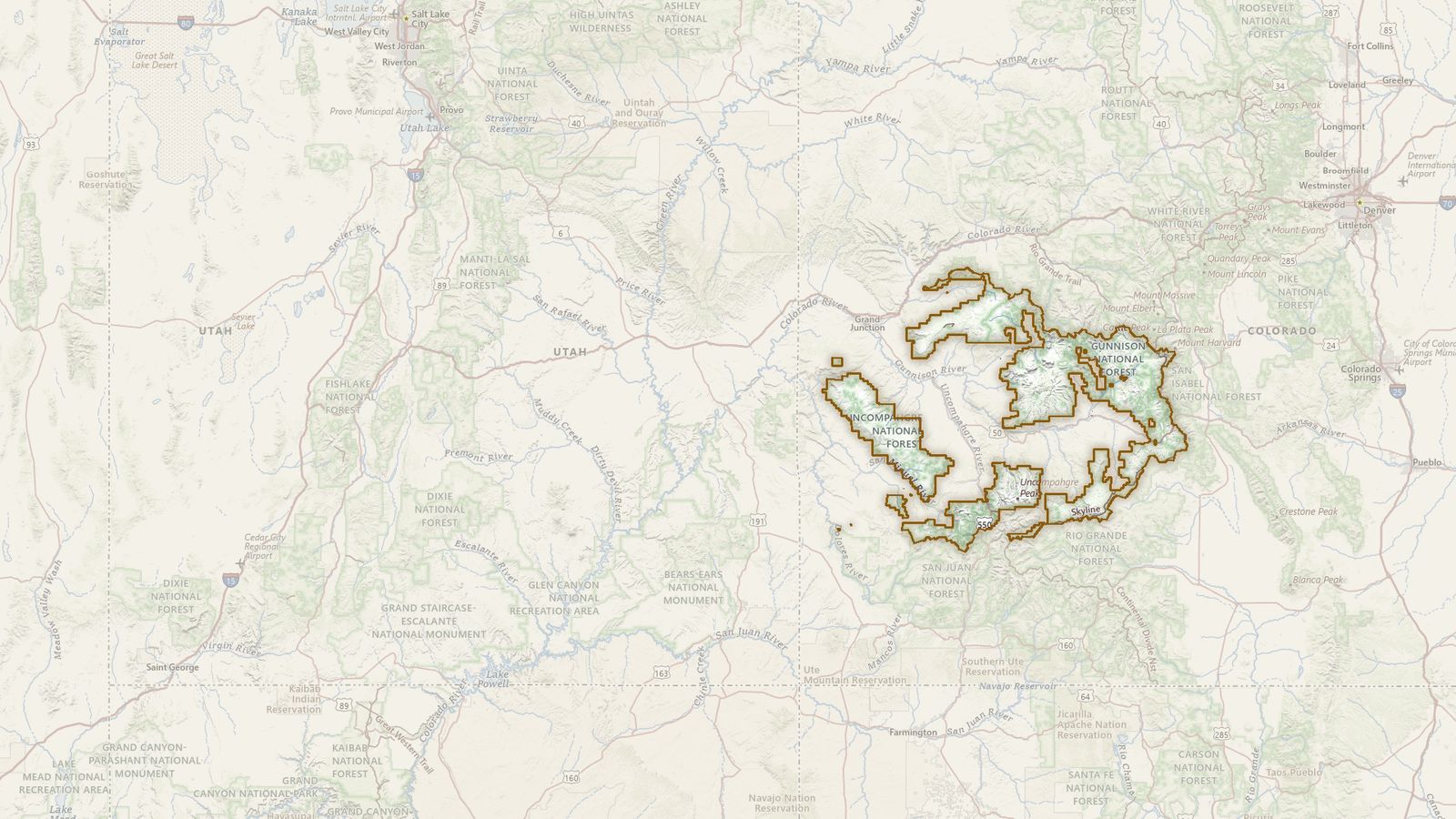 The boundary of the Grand Mesa, Uncompahgre and Gunnison National Forests drawn on the USGS topographic map, with the towns, highways and rivers around it.