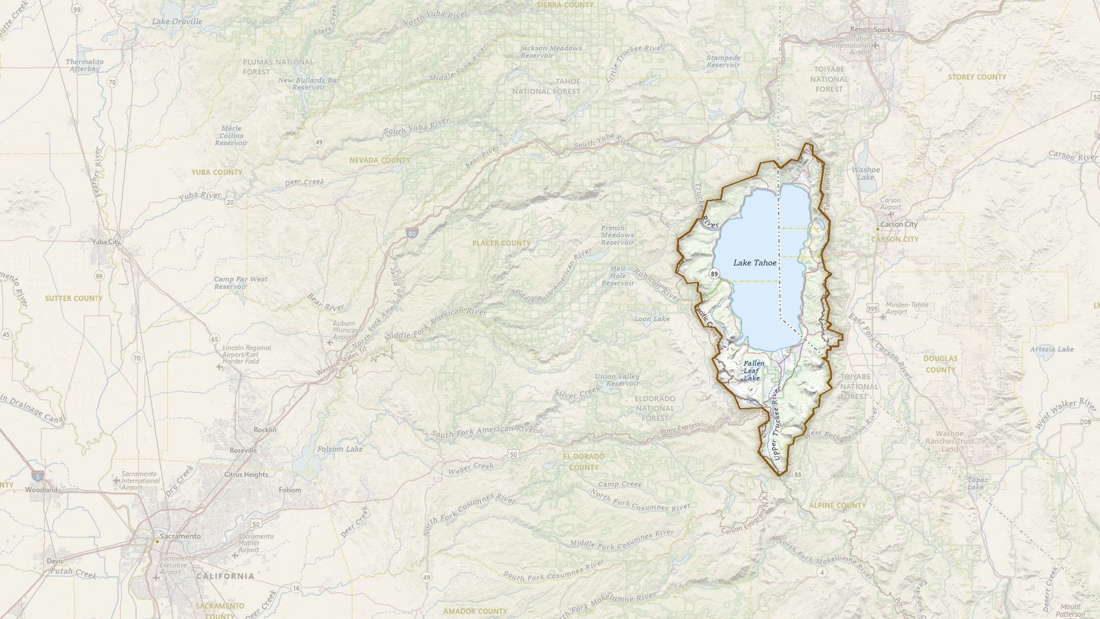 The boundary of the Lake Tahoe Basin Management Unit drawn on the USGS topographic map, with the towns, highways and rivers around it.