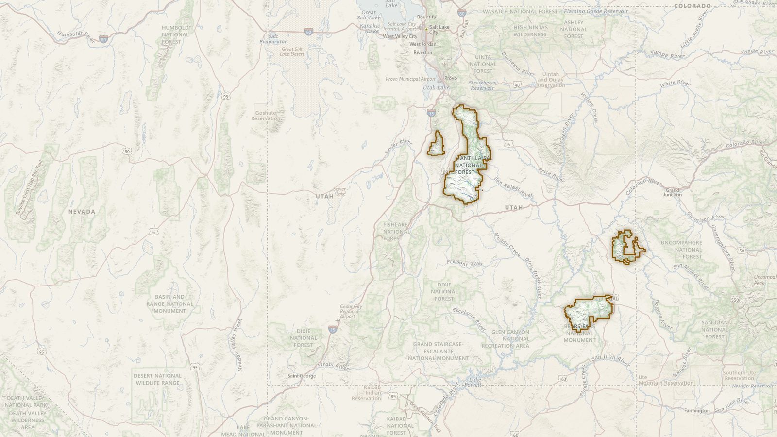 The boundary of the Manti-La Sal National Forest drawn on the USGS topographic map, with the towns, highways and rivers around it.