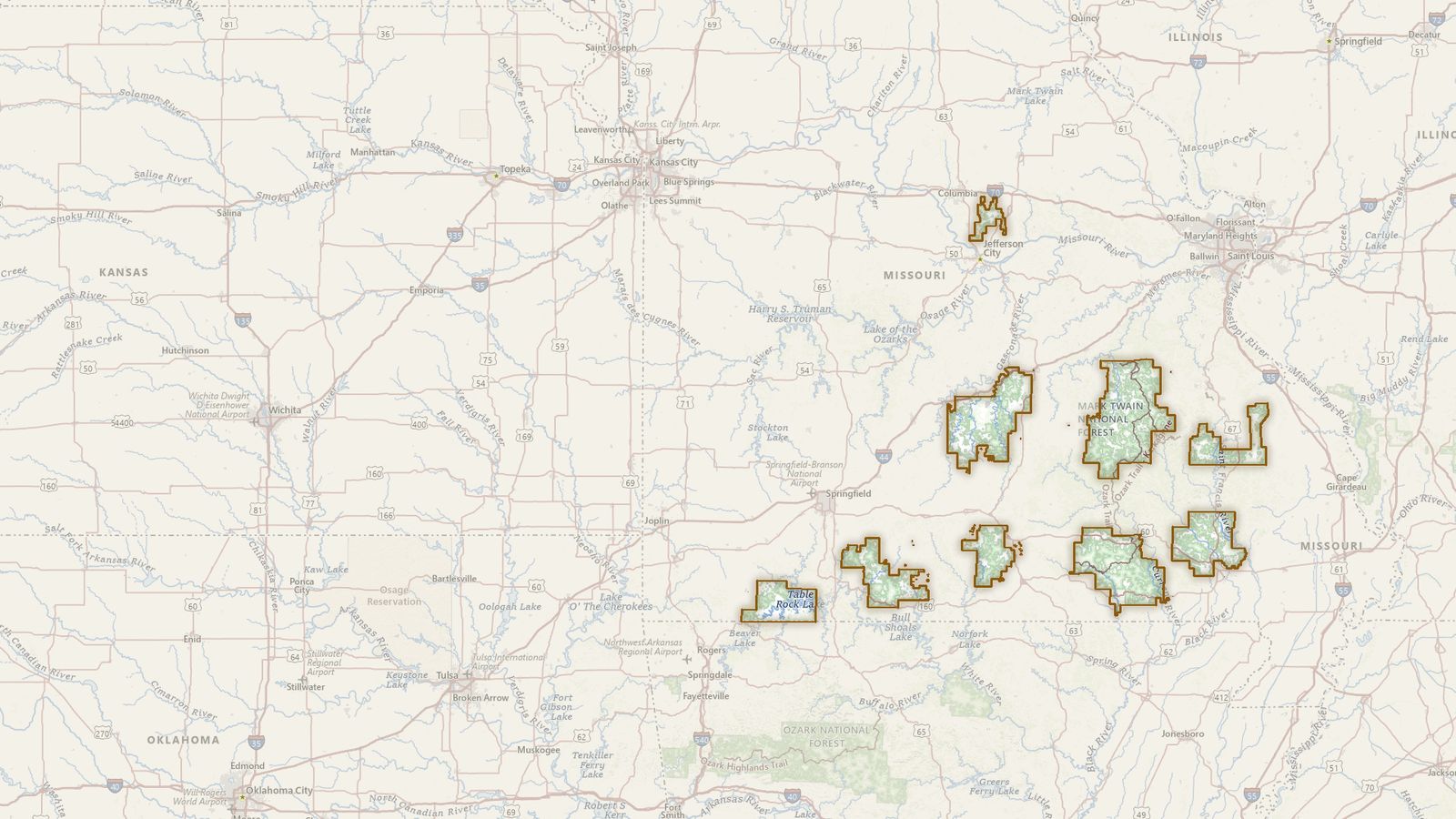 The boundary of the Mark Twain National Forest drawn on the USGS topographic map, with the towns, highways and rivers around it.