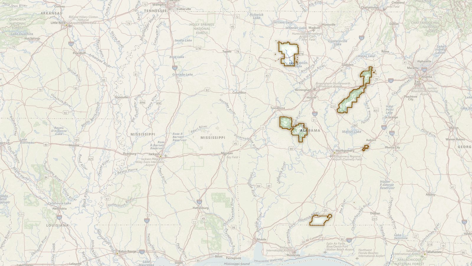The boundary of the National Forests in Alabama drawn on the USGS topographic map, with the towns, highways and rivers around it.
