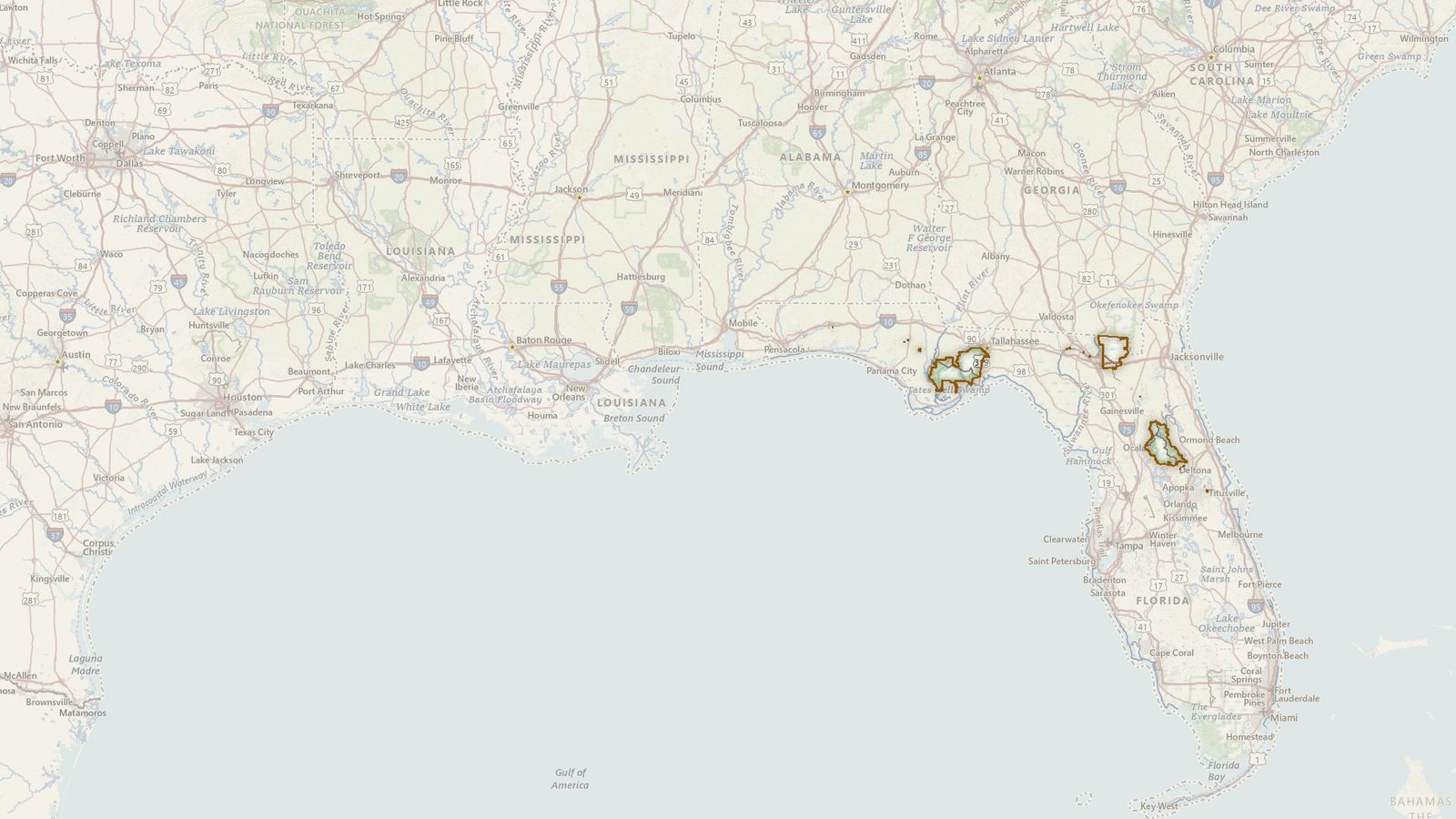 The boundary of the National Forests in Florida drawn on the USGS topographic map, with the towns, highways and rivers around it.