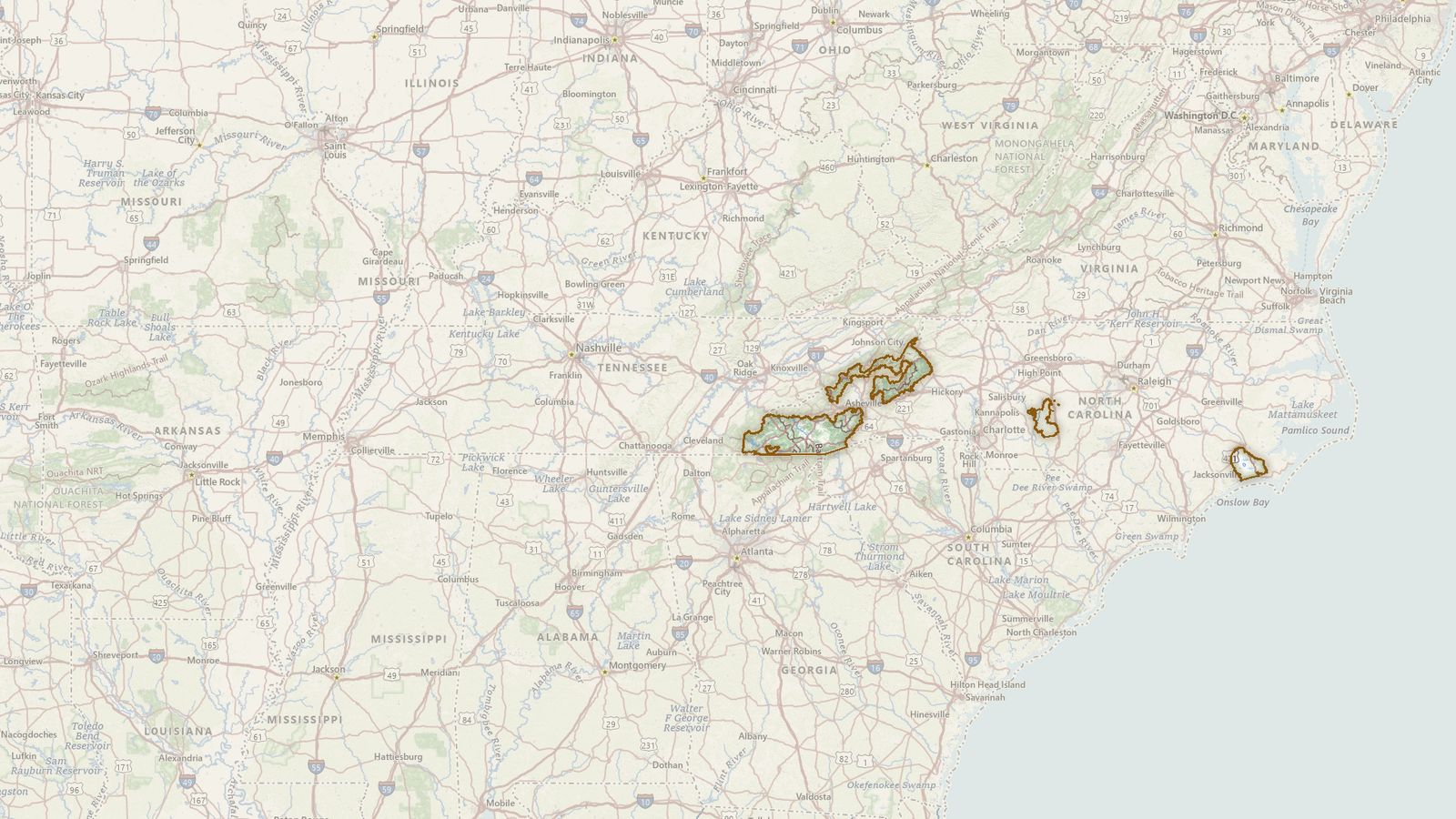 The boundary of the National Forests in North Carolina drawn on the USGS topographic map, with the towns, highways and rivers around it.