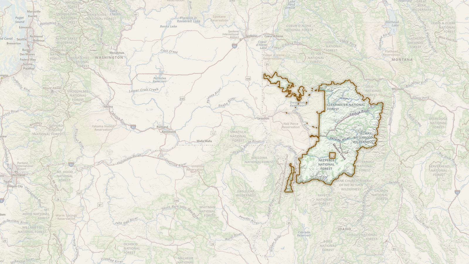 The boundary of the Nez Perce-Clearwater National Forest drawn on the USGS topographic map, with the towns, highways and rivers around it.