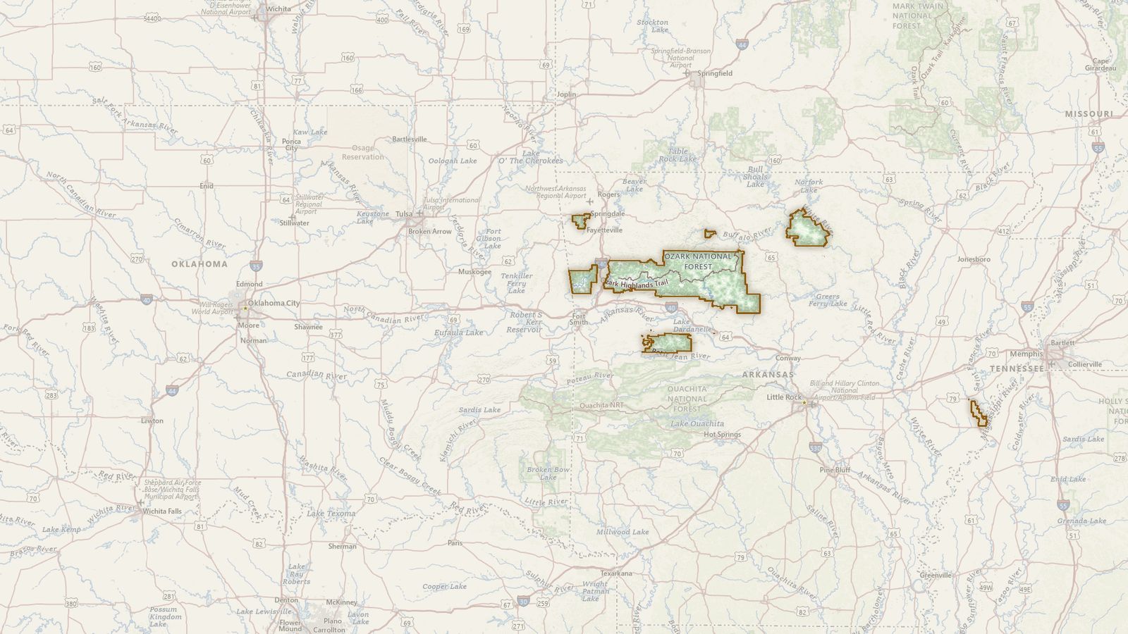 The boundary of the Ozark-St. Francis National Forest drawn on the USGS topographic map, with the towns, highways and rivers around it.