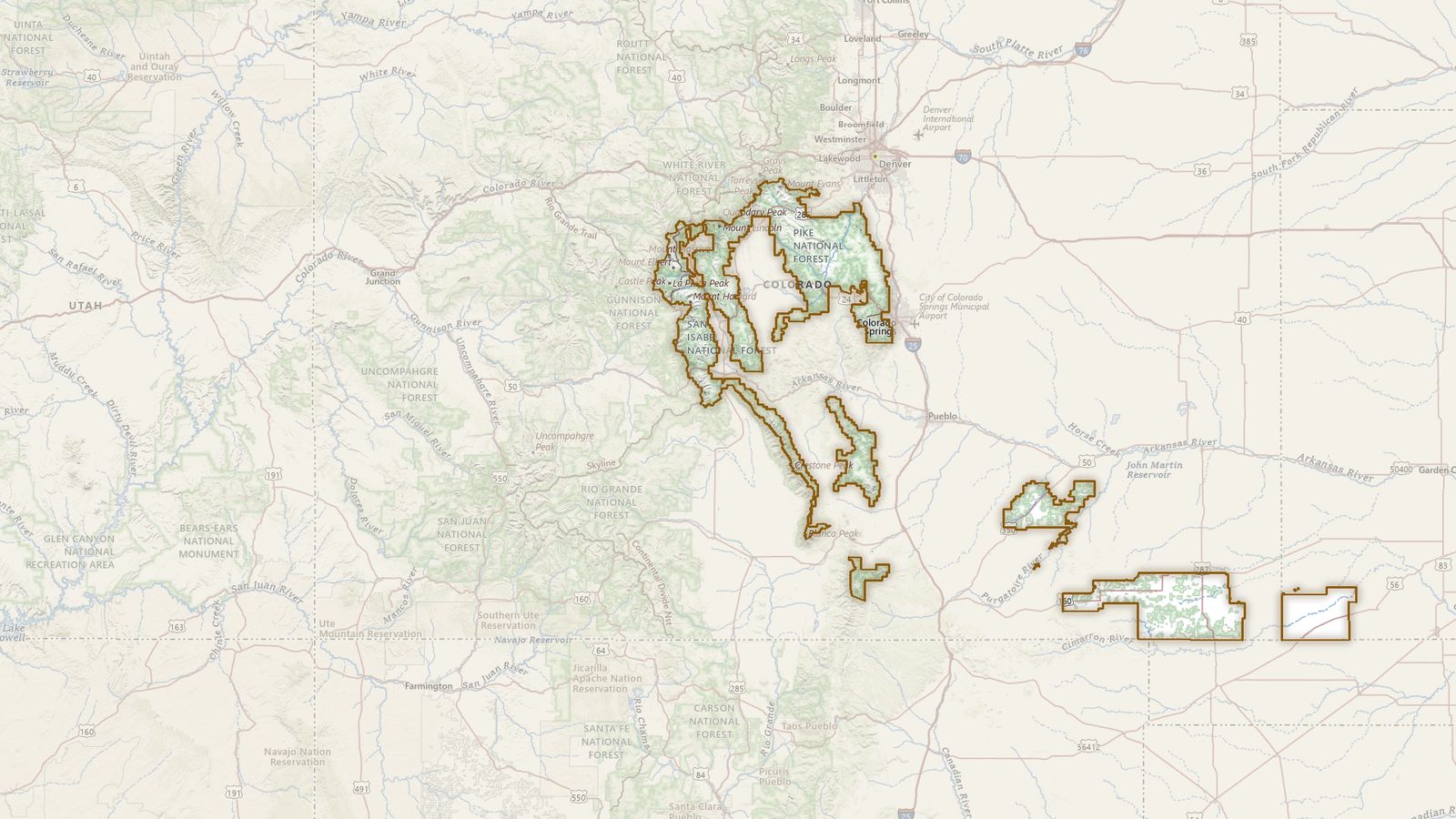 The boundary of the Pike and San Isabel National Forests drawn on the USGS topographic map, with the towns, highways and rivers around it.