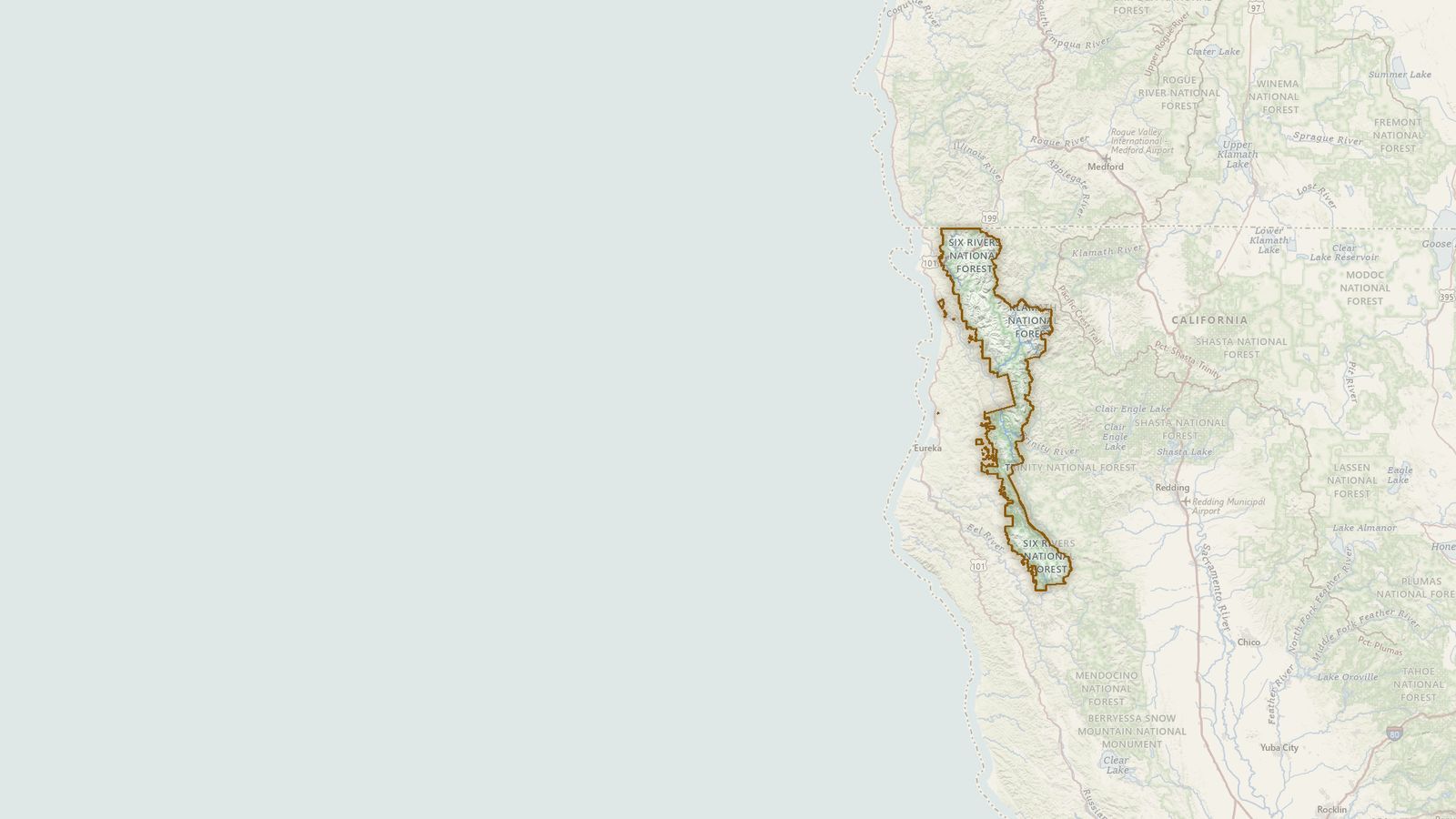 The boundary of the Six Rivers National Forest drawn on the USGS topographic map, with the towns, highways and rivers around it.