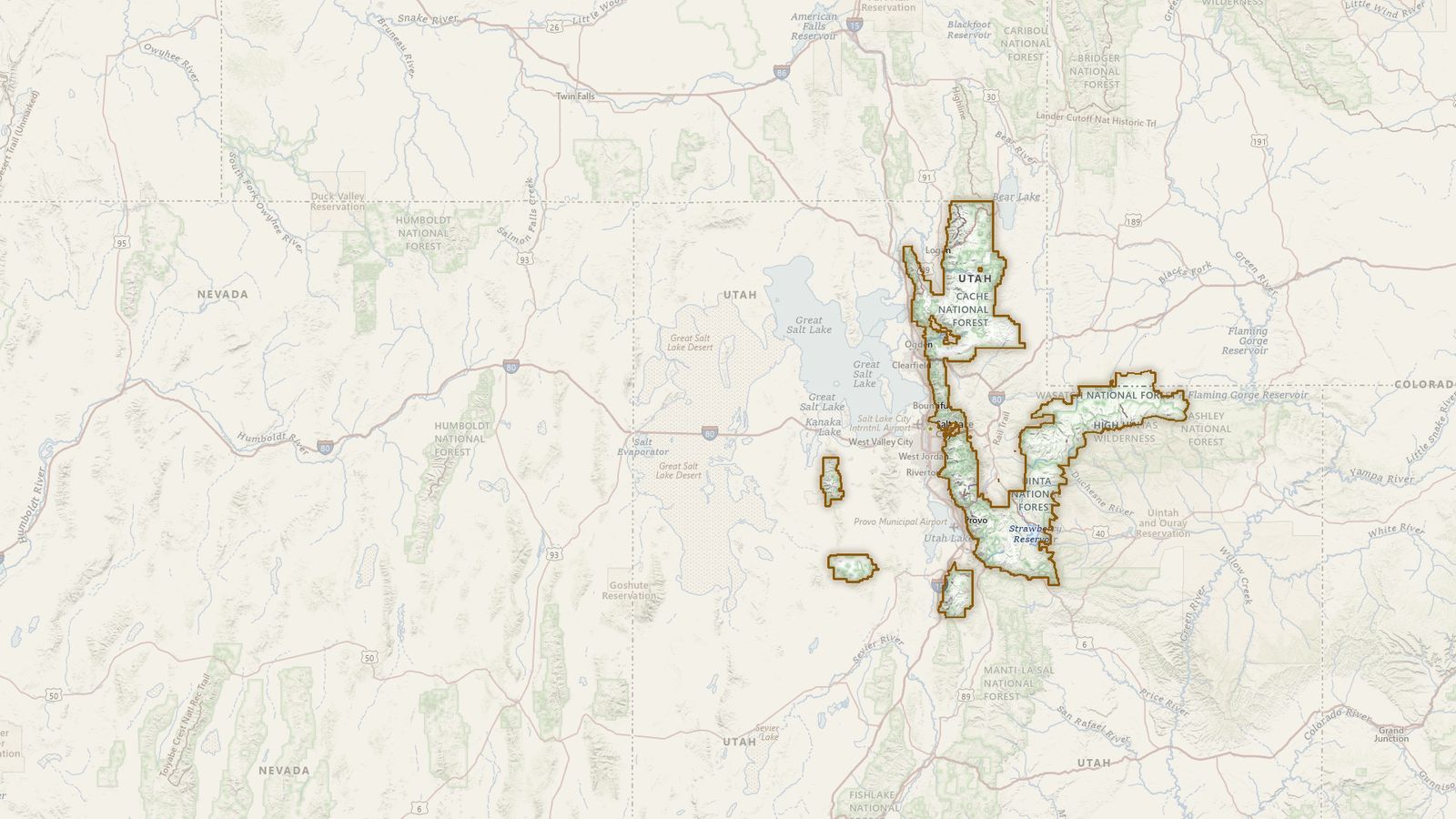The boundary of the Uinta-Wasatch-Cache National Forest drawn on the USGS topographic map, with the towns, highways and rivers around it.