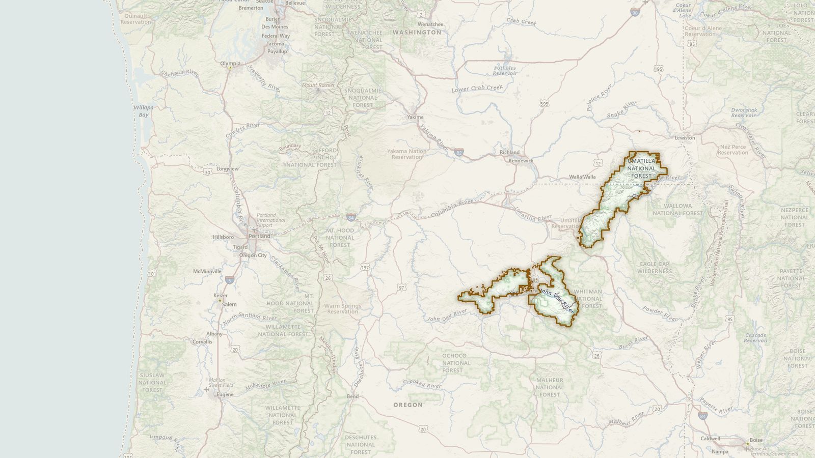 The boundary of the Umatilla National Forest drawn on the USGS topographic map, with the towns, highways and rivers around it.