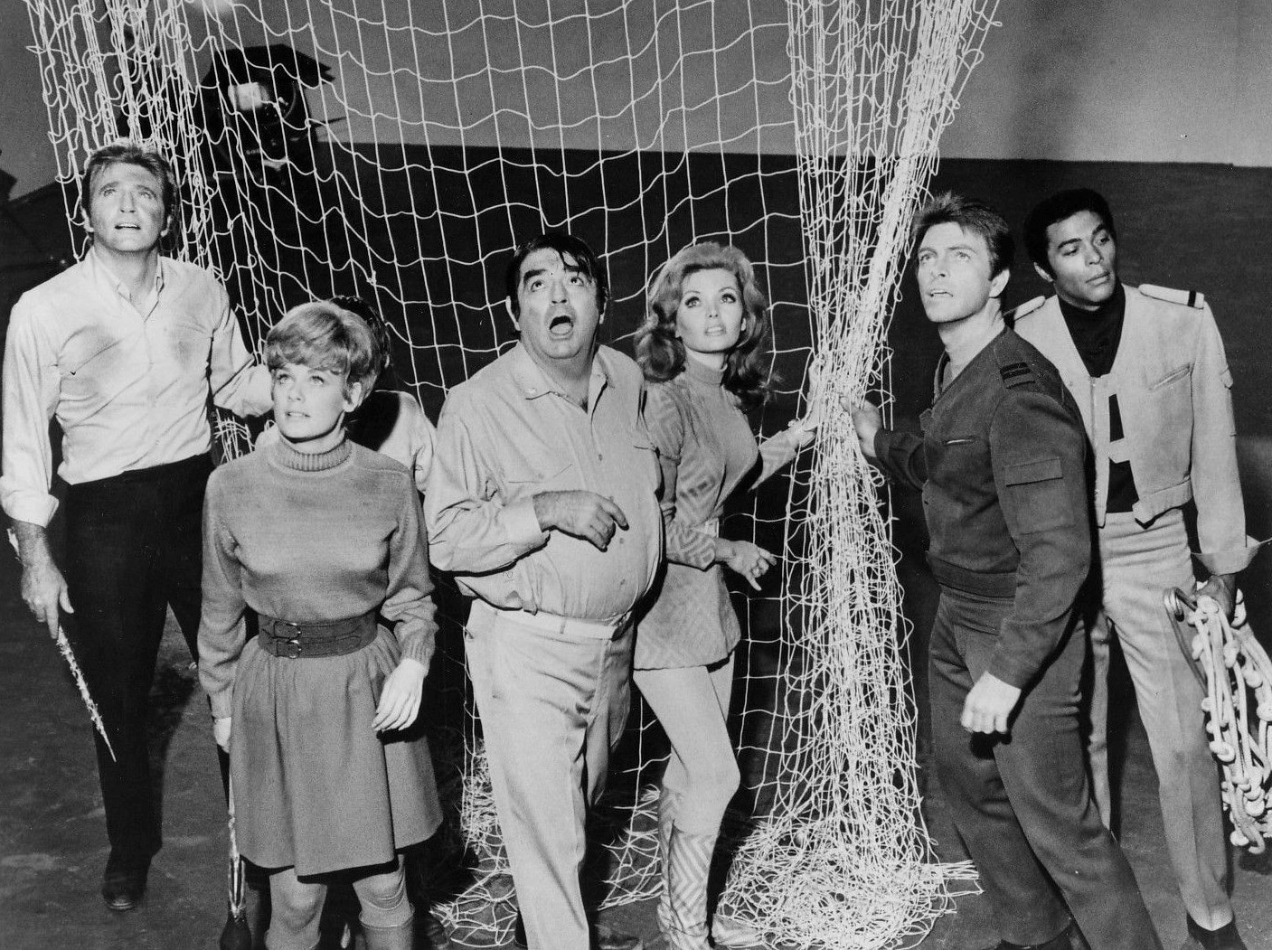 Publicity photo of the cast of Land of the Giants television program. Shown left to right: Don Matheson, Heather Young, Kurt Kasznar, Deanna Lund, Gary Conway, and Don Marshall.