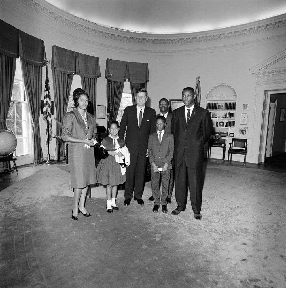 This image has an empty alt attribute; its file name is JFK-with-Evers-Family-Wikimedia.jpg