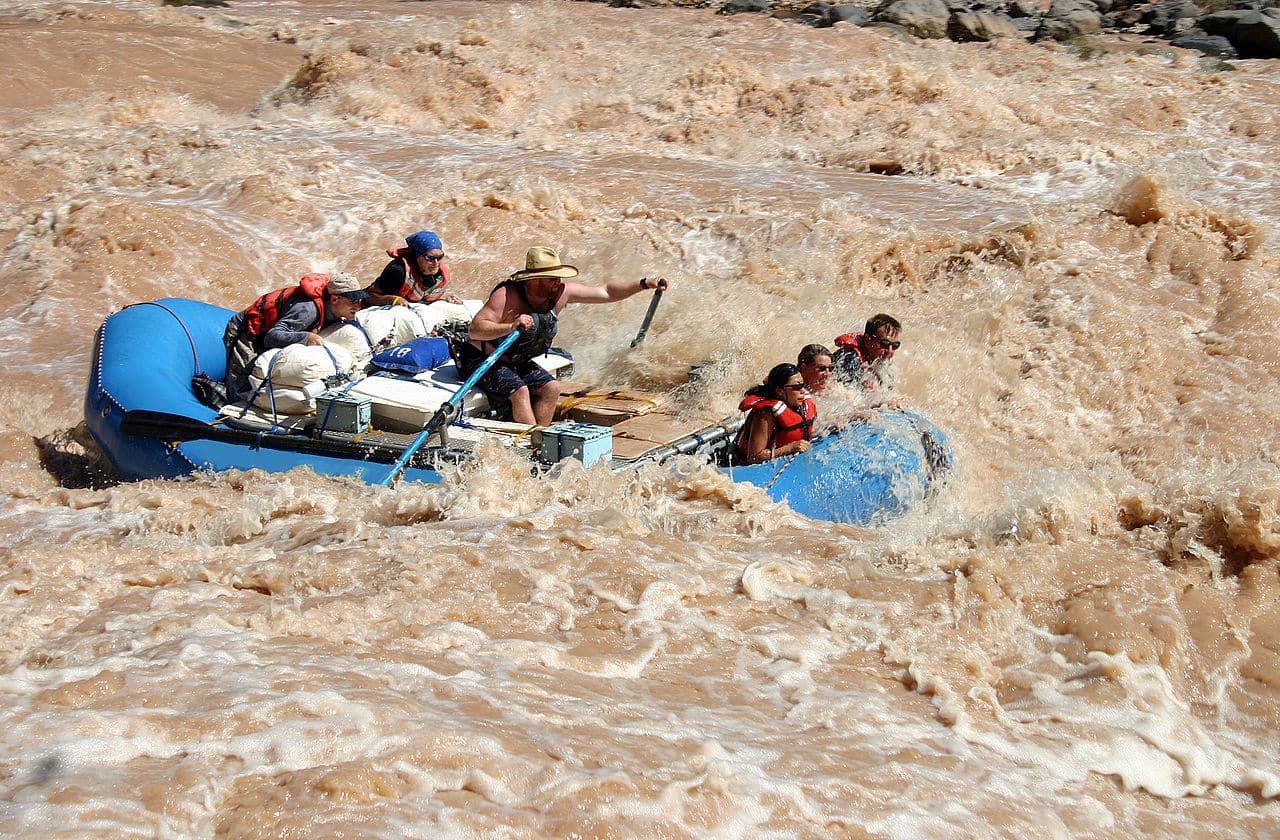 Boaters running Lava Falls Rapid on the Colorado River in Grand Canyon National Park. 
