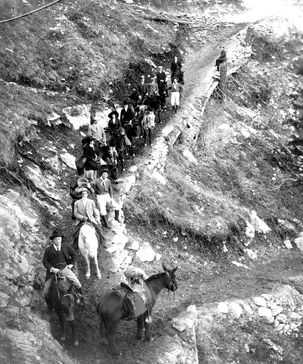 TEDDY ROOSEVELT, JOHN HANCE, & THE COLGATE PARTY START DOWN THE BRIGHT ANGEL TRAIL IN GRAND CANYON. 17 MAR 1911. KOLB BROS.