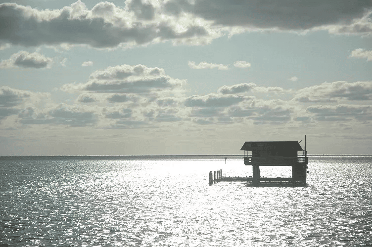 Stiltsville in the morning sunlight and the Atlantic Ocean beyond | Biscayne National Park Facts