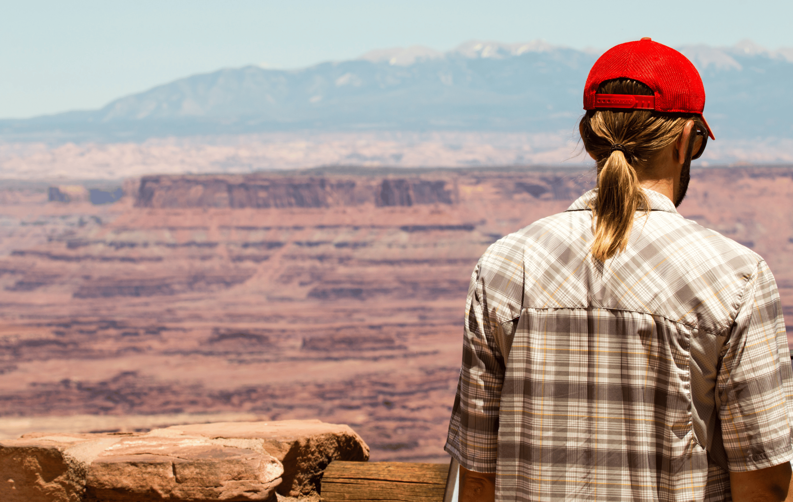 A visitor takes in the view at Canyonlands National Park | Canyonlands National Park Facts