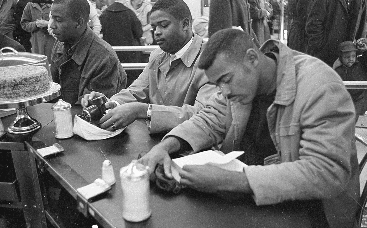 Three African American Civil Rights protesters and Woolworth's Sit-In, Durham, NC, 10 February 1960