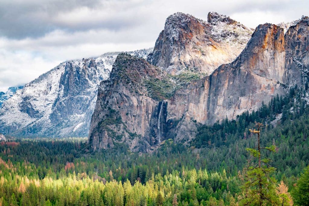 Tunnel View with the valley oaks in fall color and first snow on the rim.