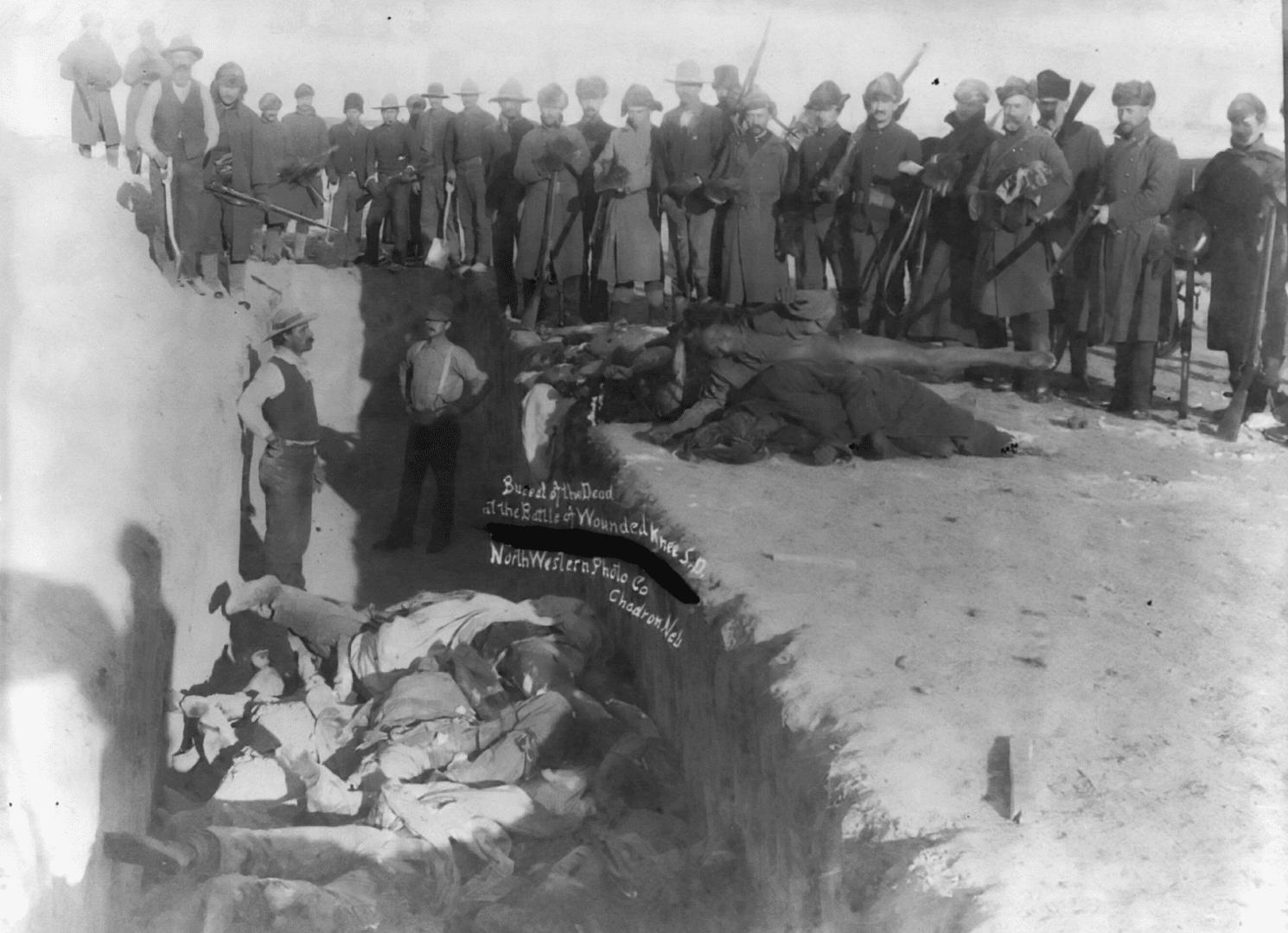 Mass grave of Lakota dead — after the 1890 Wounded Knee Massacre