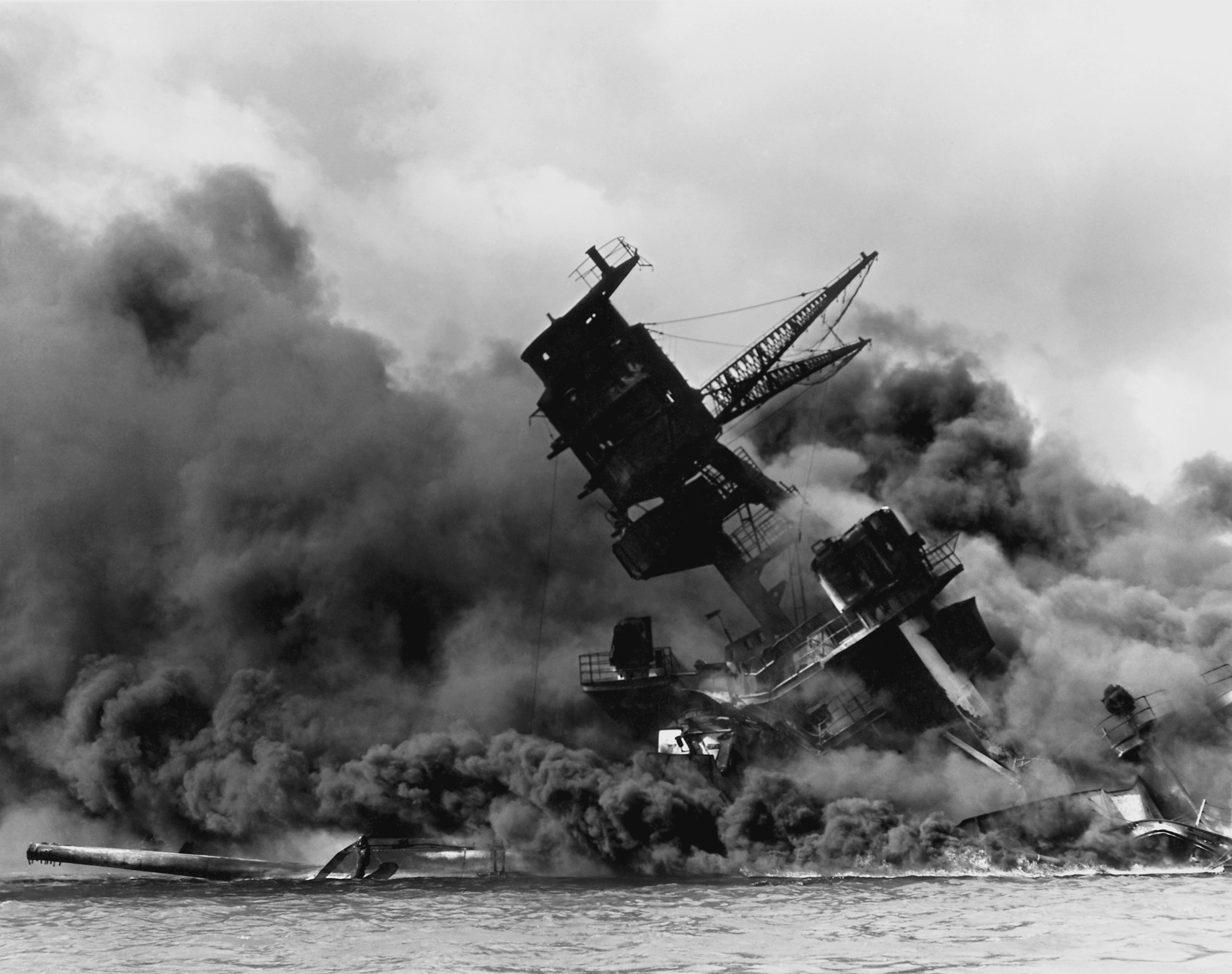The USS Arizona (BB-39) burning after the Japanese attack on Pearl Harbor, 7 December 1941
