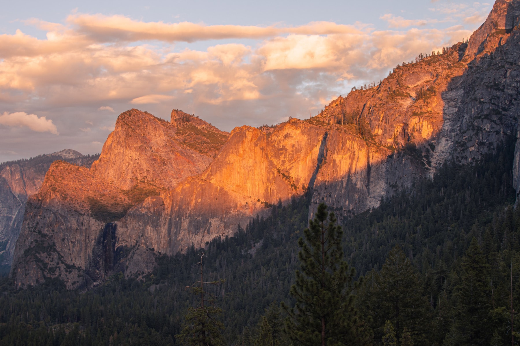 The golden hour sunset on the granite mountains of Yosemite.