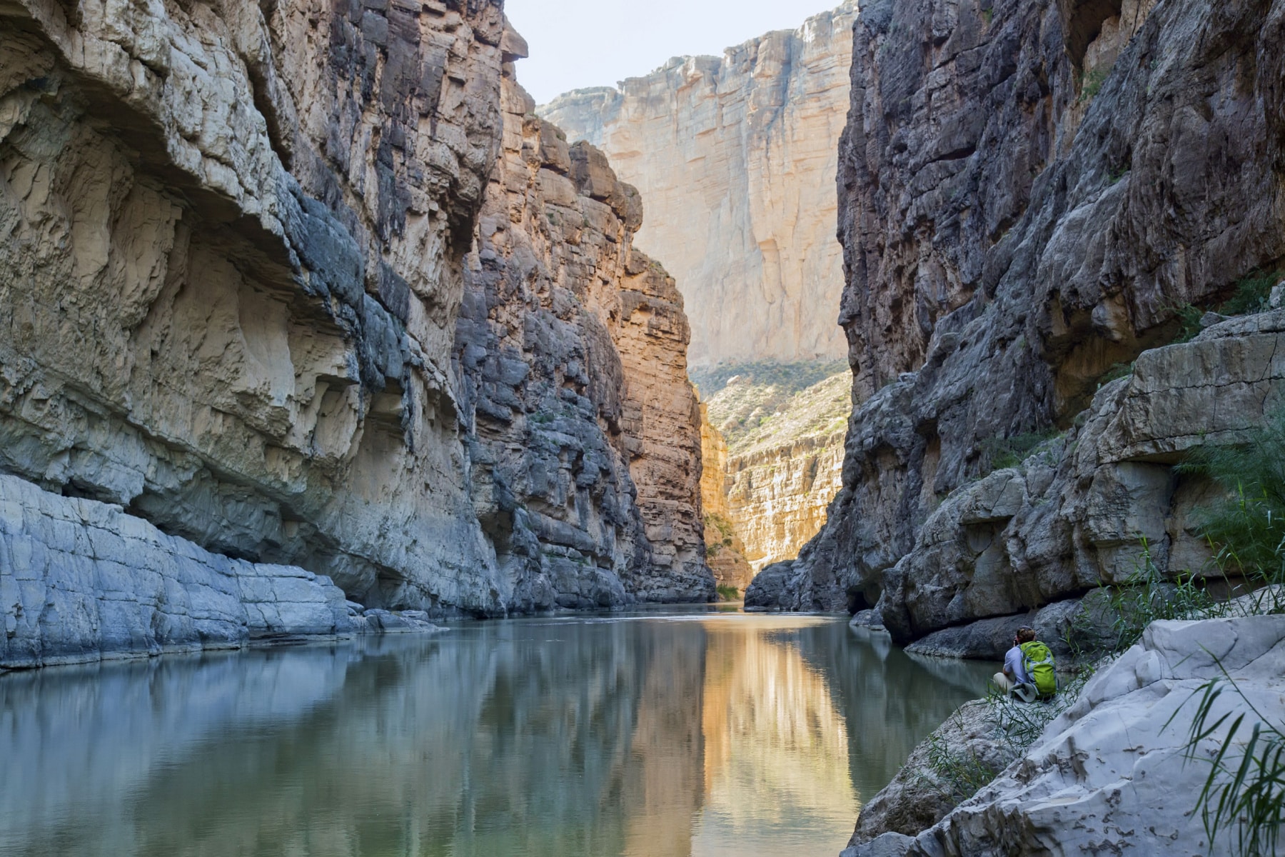 Rio Grande in Big Bend National Park with two towering cliff walls on either side.