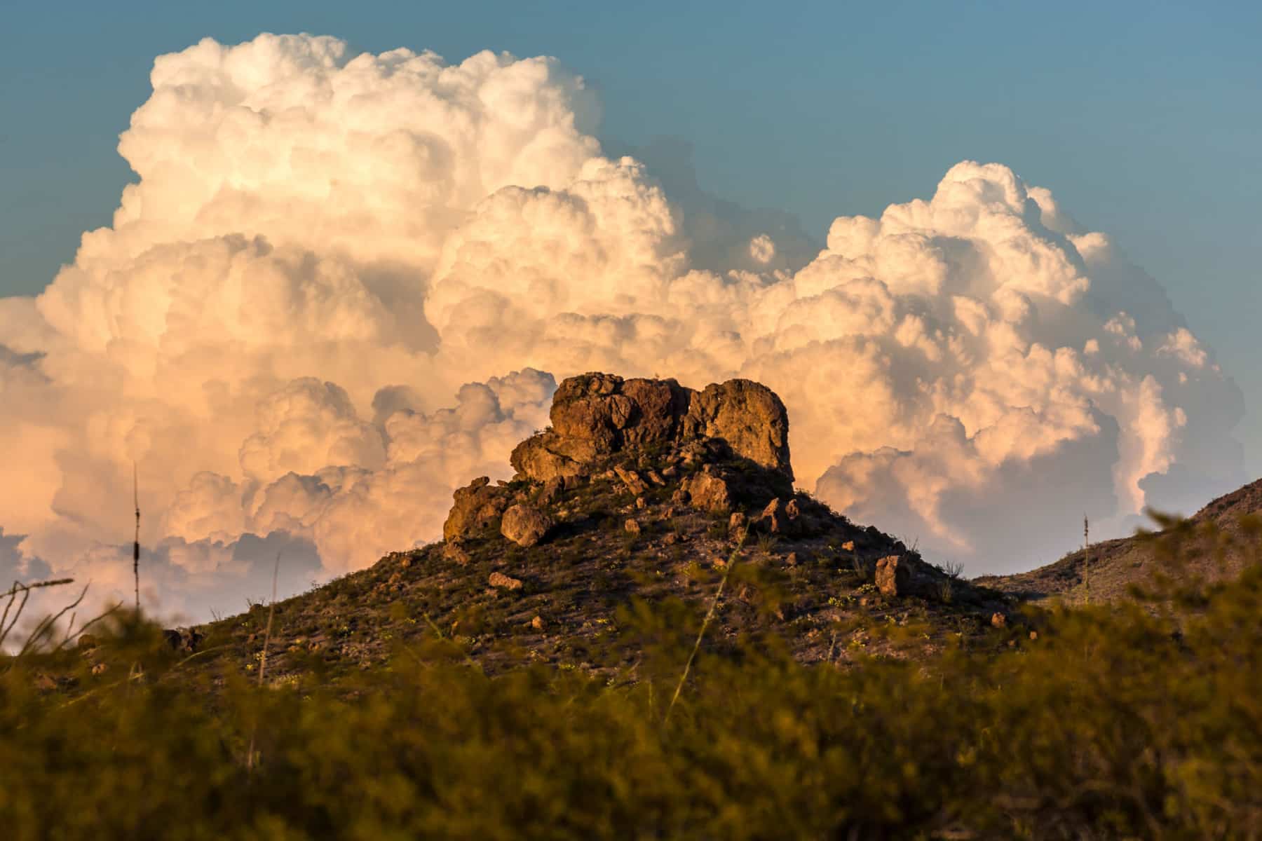 Storm clouds develop above a mountain in Big Bend National Park. 