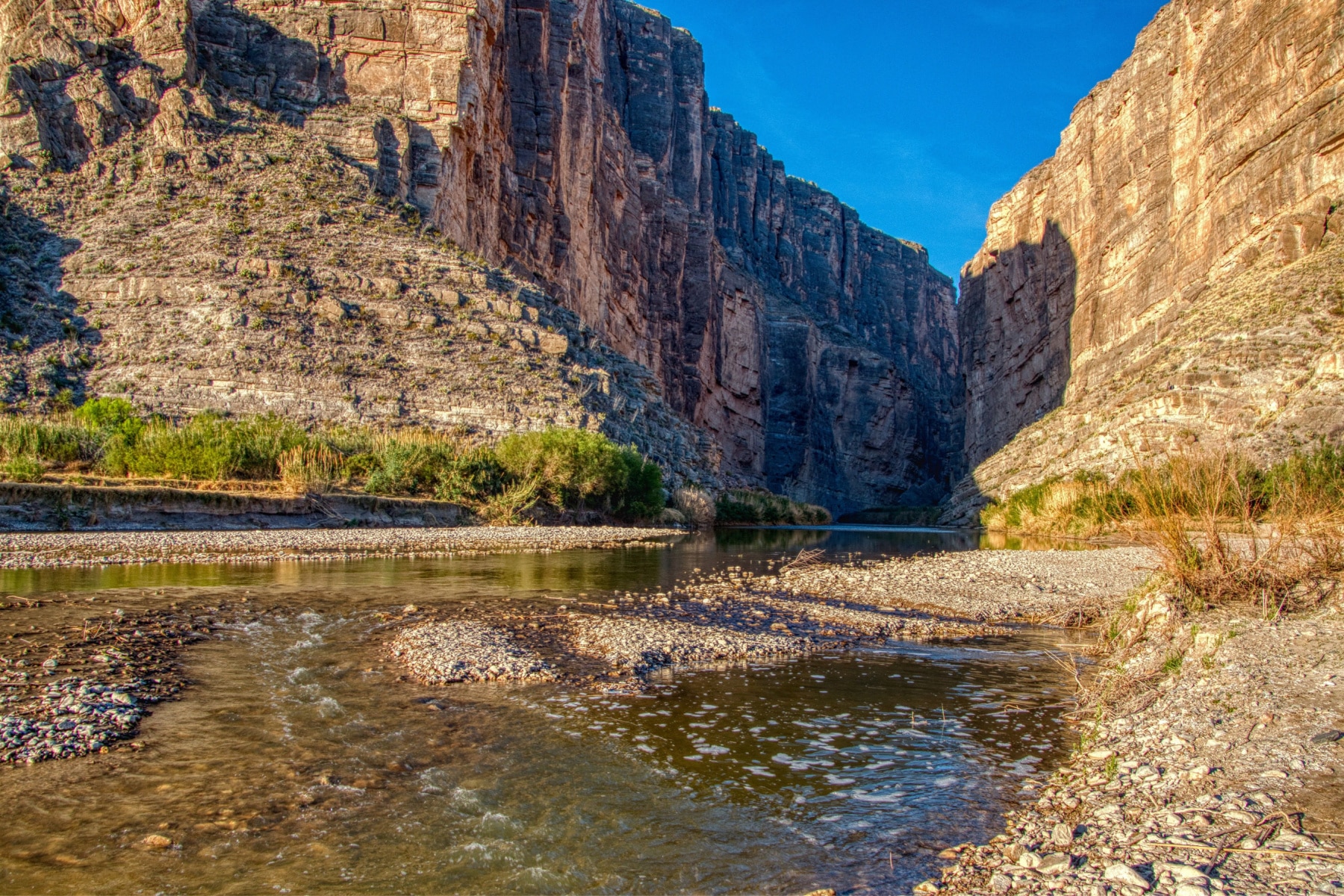 The Rio Grande runs between two vertical cliffs along the best hikes in Big Bend National Park. 