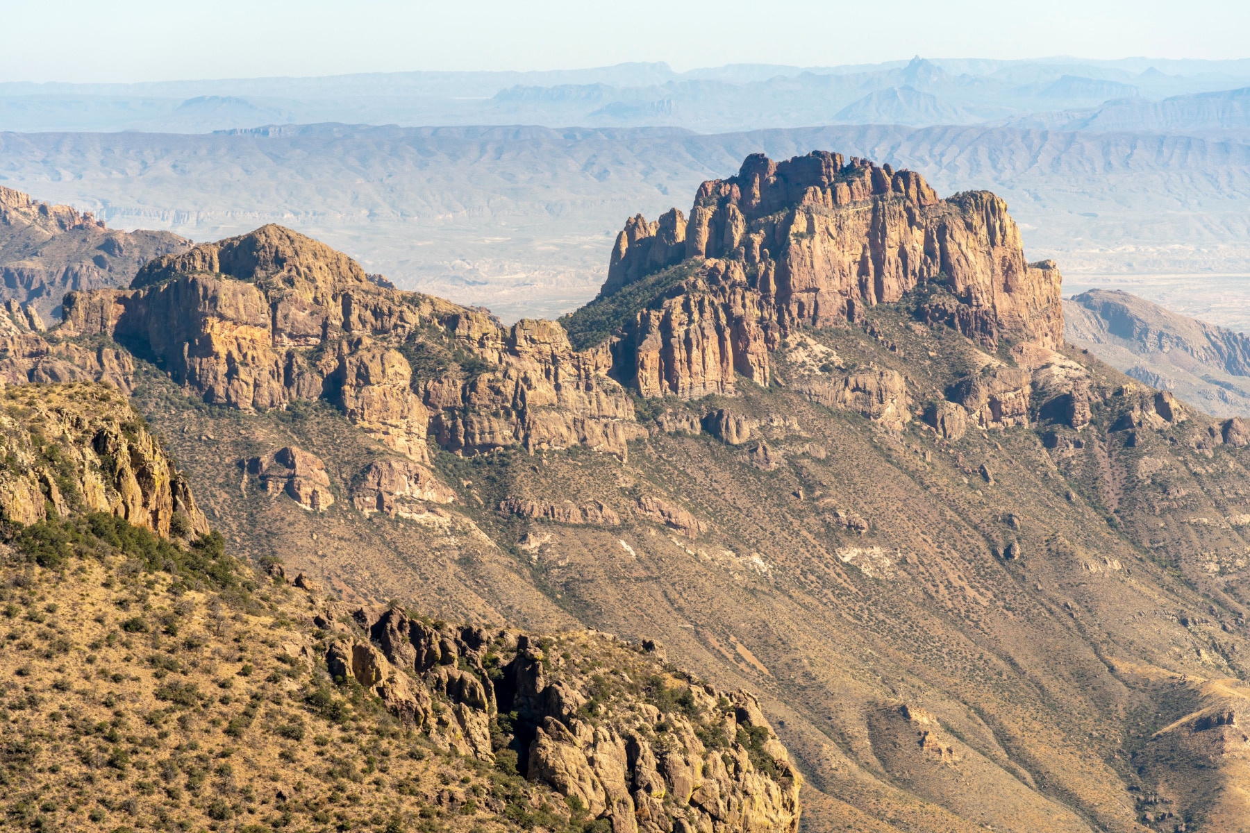 Canyon walls rise above the valley in the Emory Peak Trail, one of the best hikes in Big Bend National Park. 
