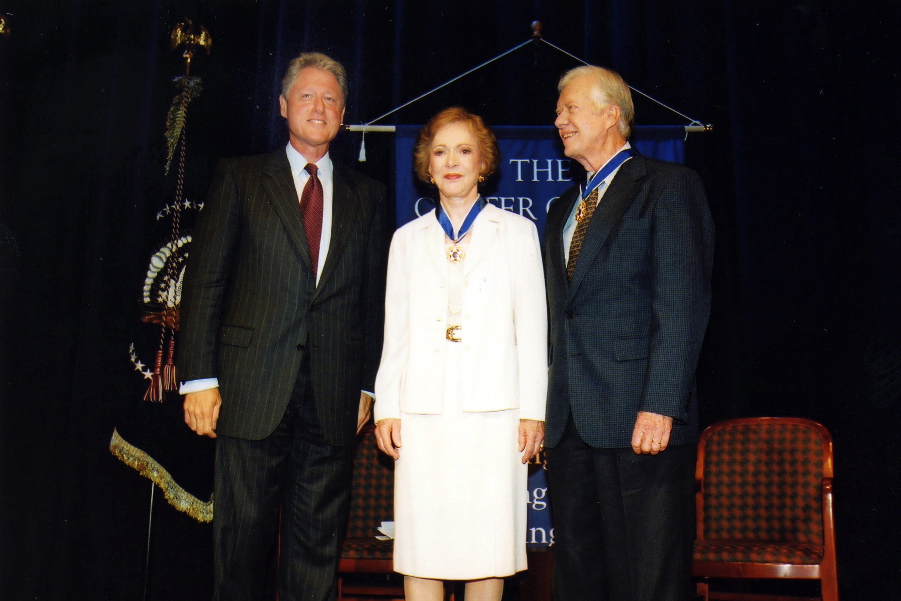 Bill Clinton, Rosalynn Carter, and Jimmy Carter.