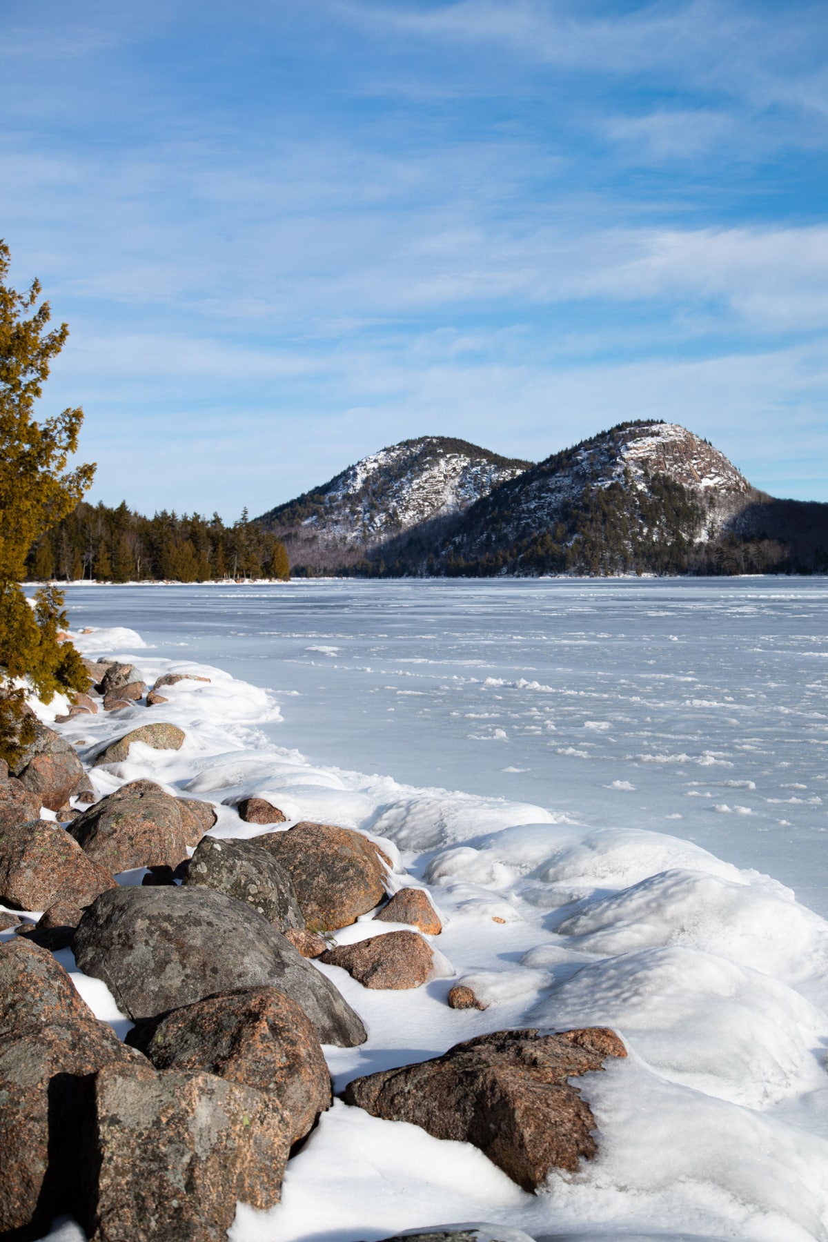 Jordan Pond in Acadia National Park frozen over in winter. 