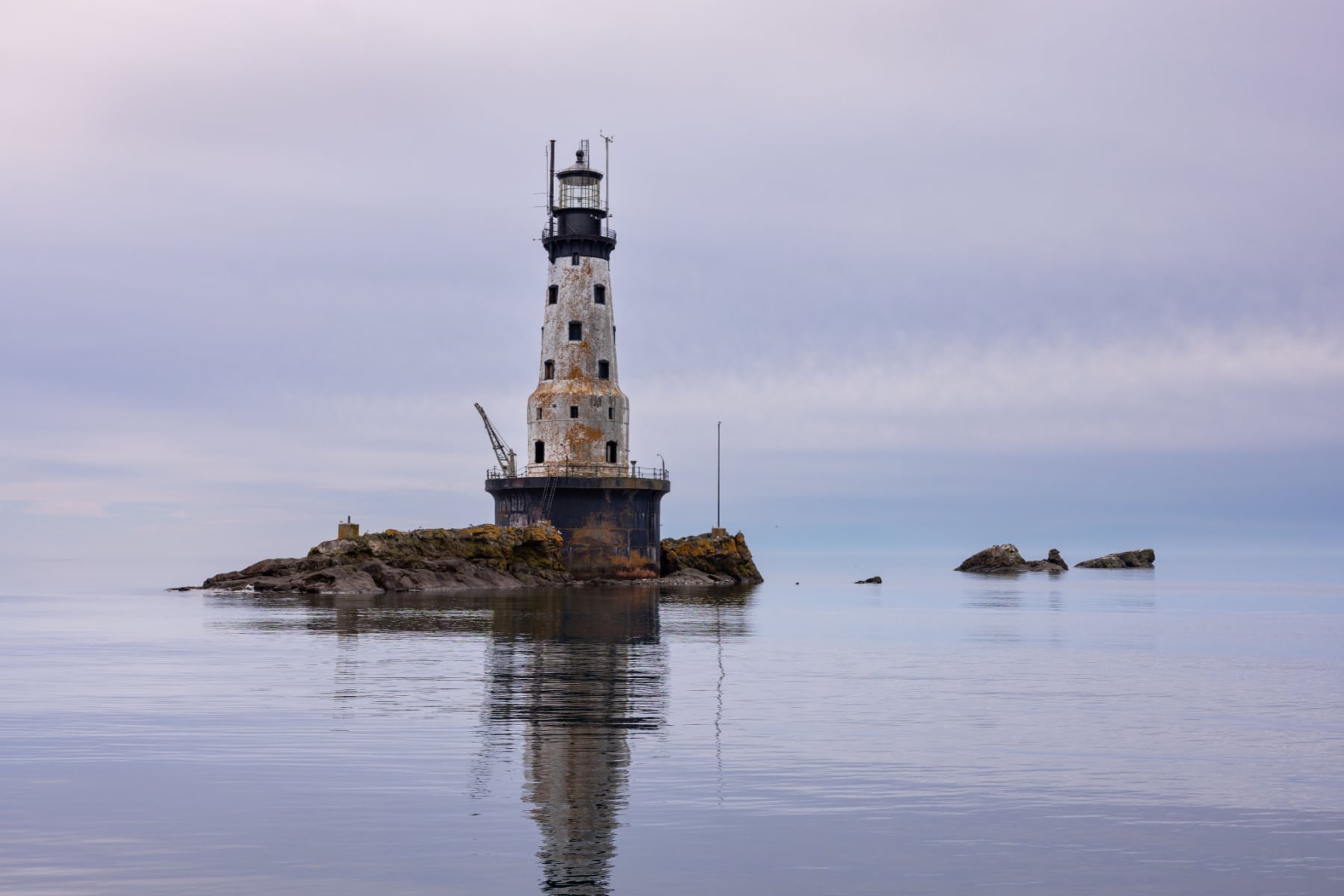 Rock of Ages Lighthouse at Isle Royale National Park sits on a stone bed in the middle of Lake Superior.