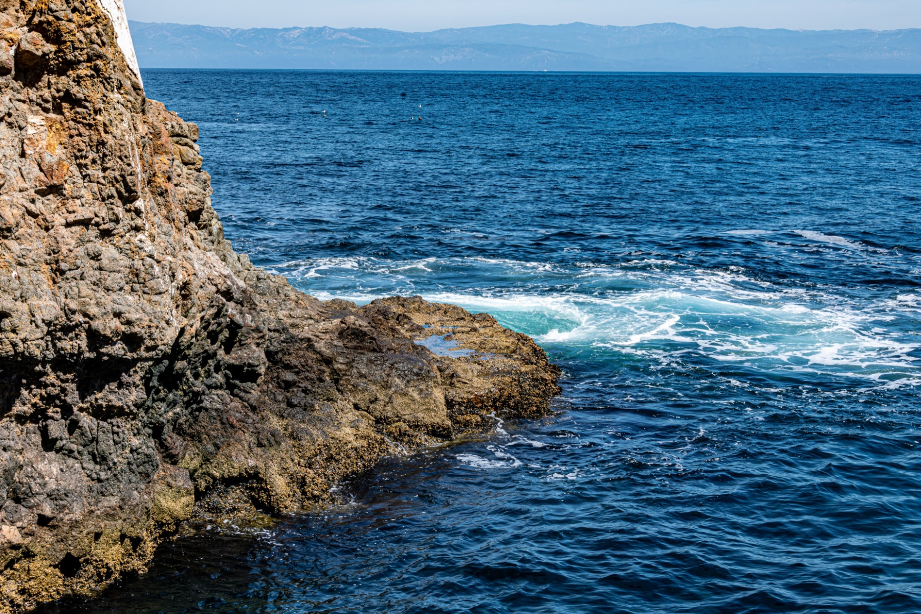 Deep blue water stands out next to rocky ridges of Channel Islands National Park. 