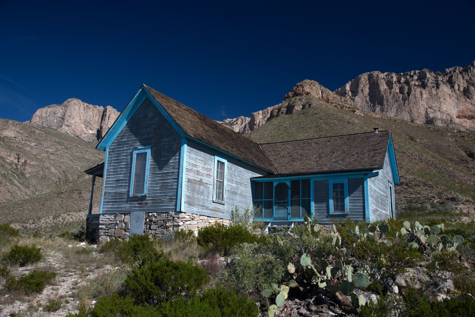 A weather blue home known as William Ranch is in a remote section of Guadalupe Mountains National Park.