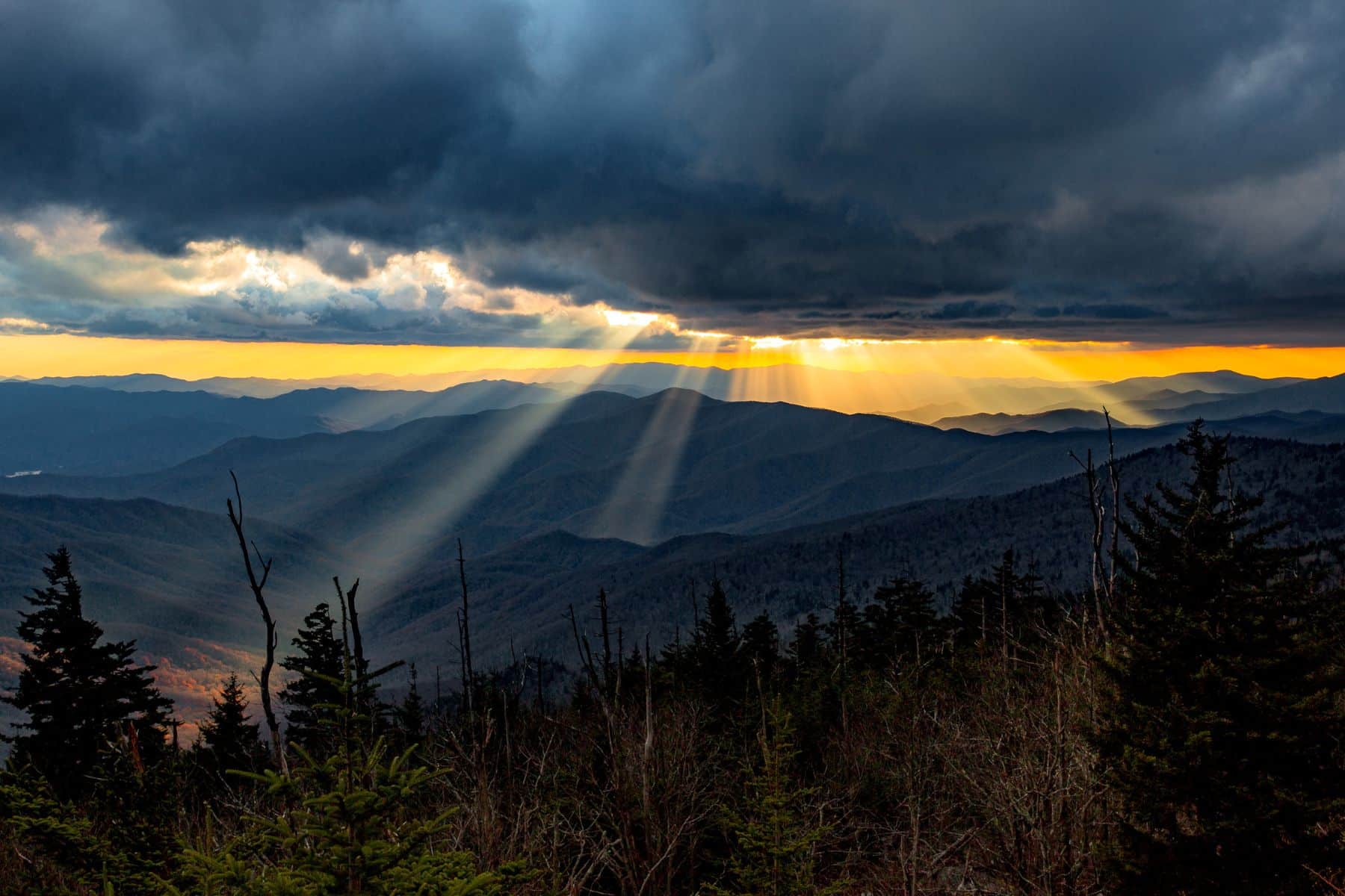 View from Clingmans Dome of sun rays coming through dark clouds.