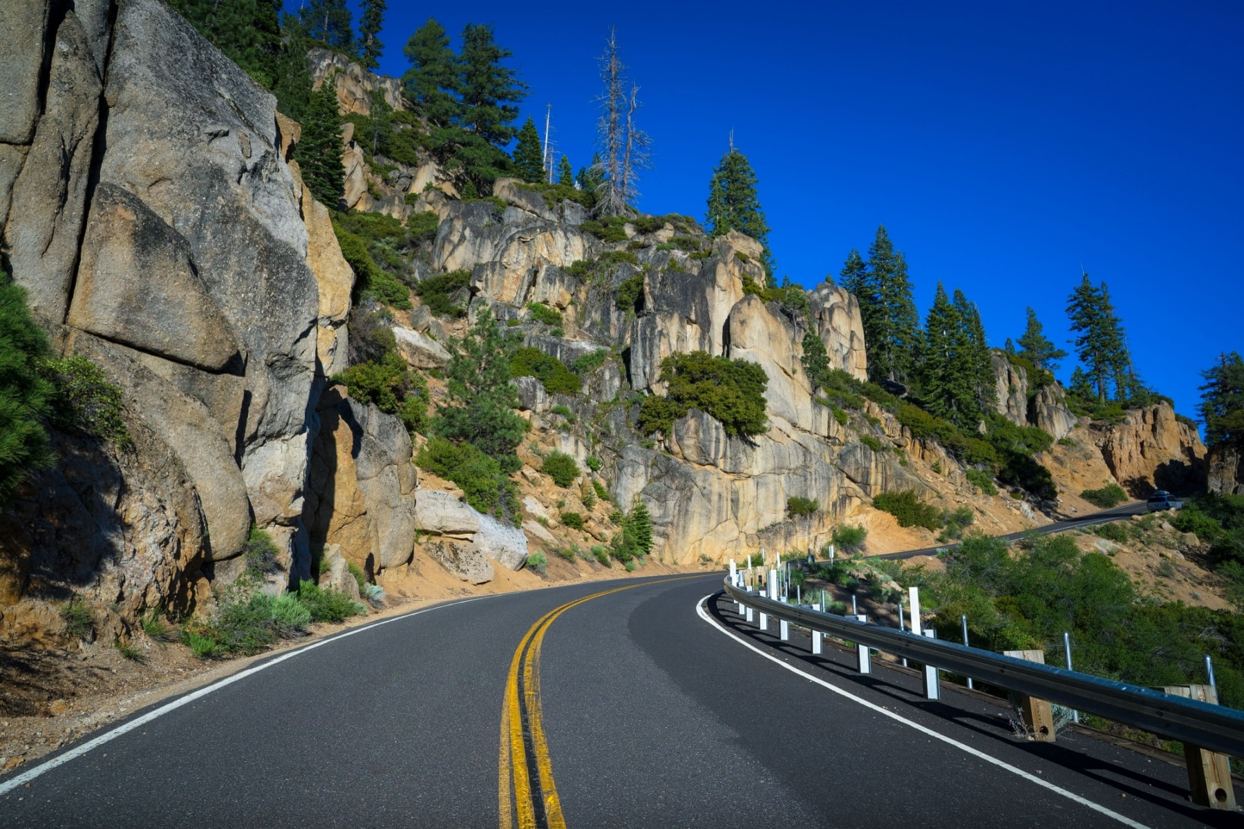 A winding mountain road to Stanislaus National Forest is a great side trip on the Yosemite to Sequoia National park road trip. 