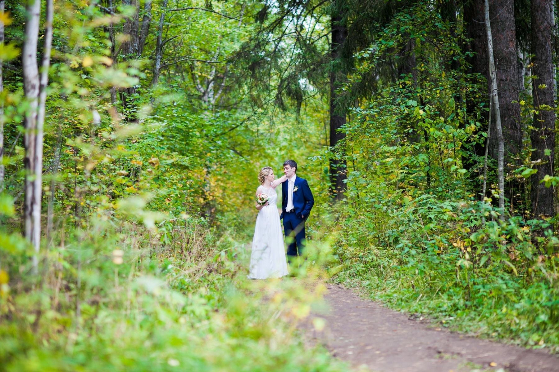 Bride and Groom on a trail during a national park wedding